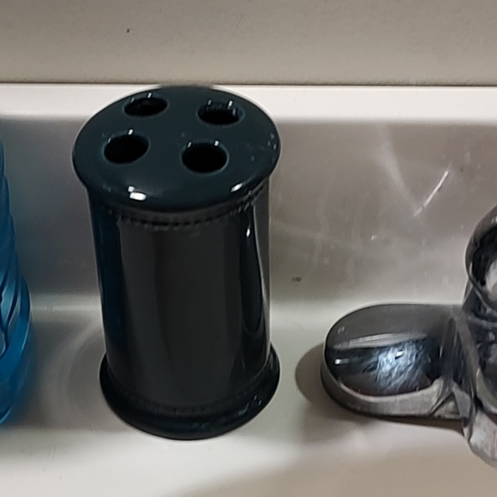 A toothbrush holder